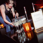 Brittney serving drinks